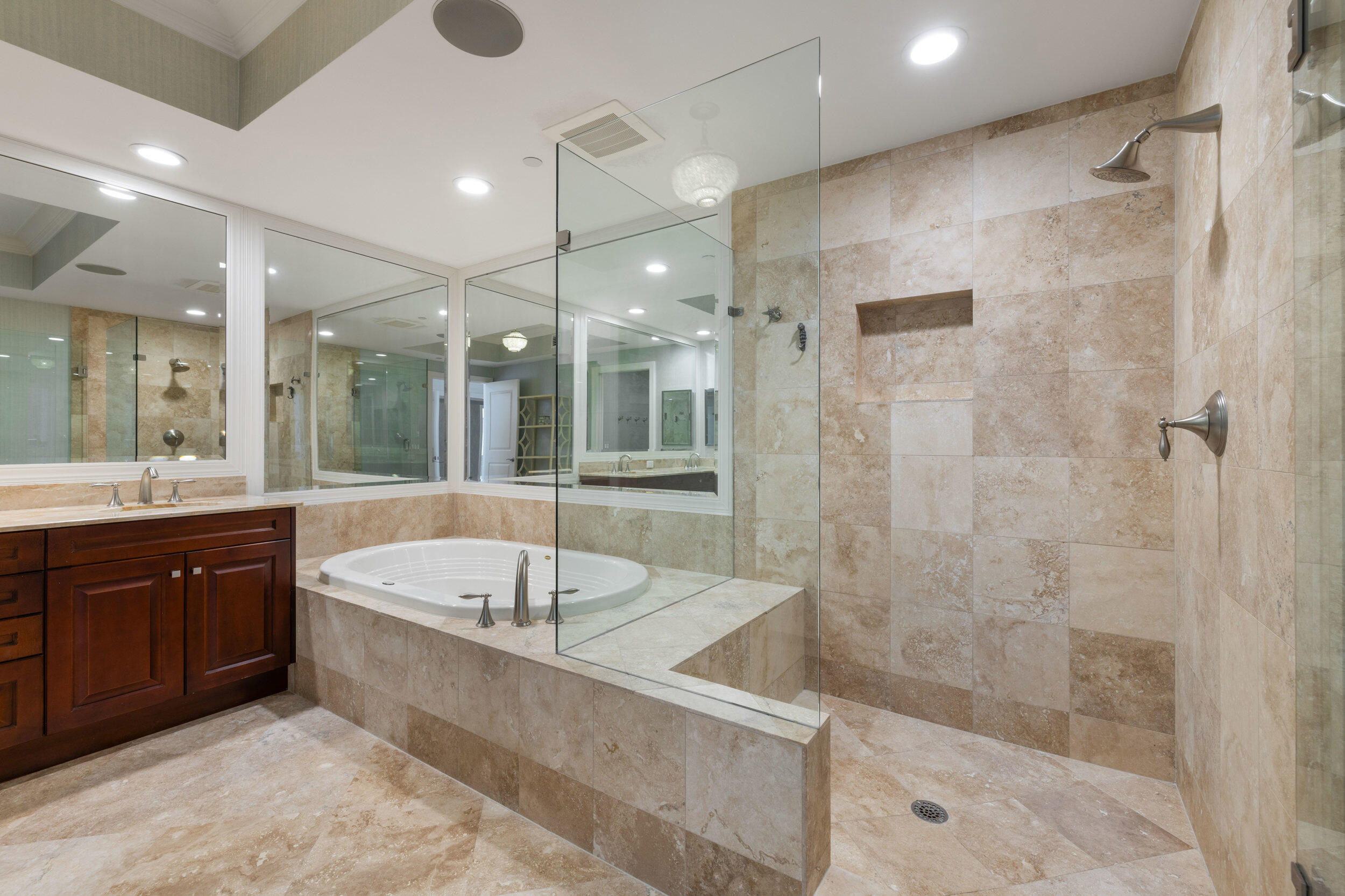 5050 North Ocean Drive, Unit 1502 Singer Island, FL 33404 - Photo 21 of 56 a large spacious bathroom with a large tub shower and sink
