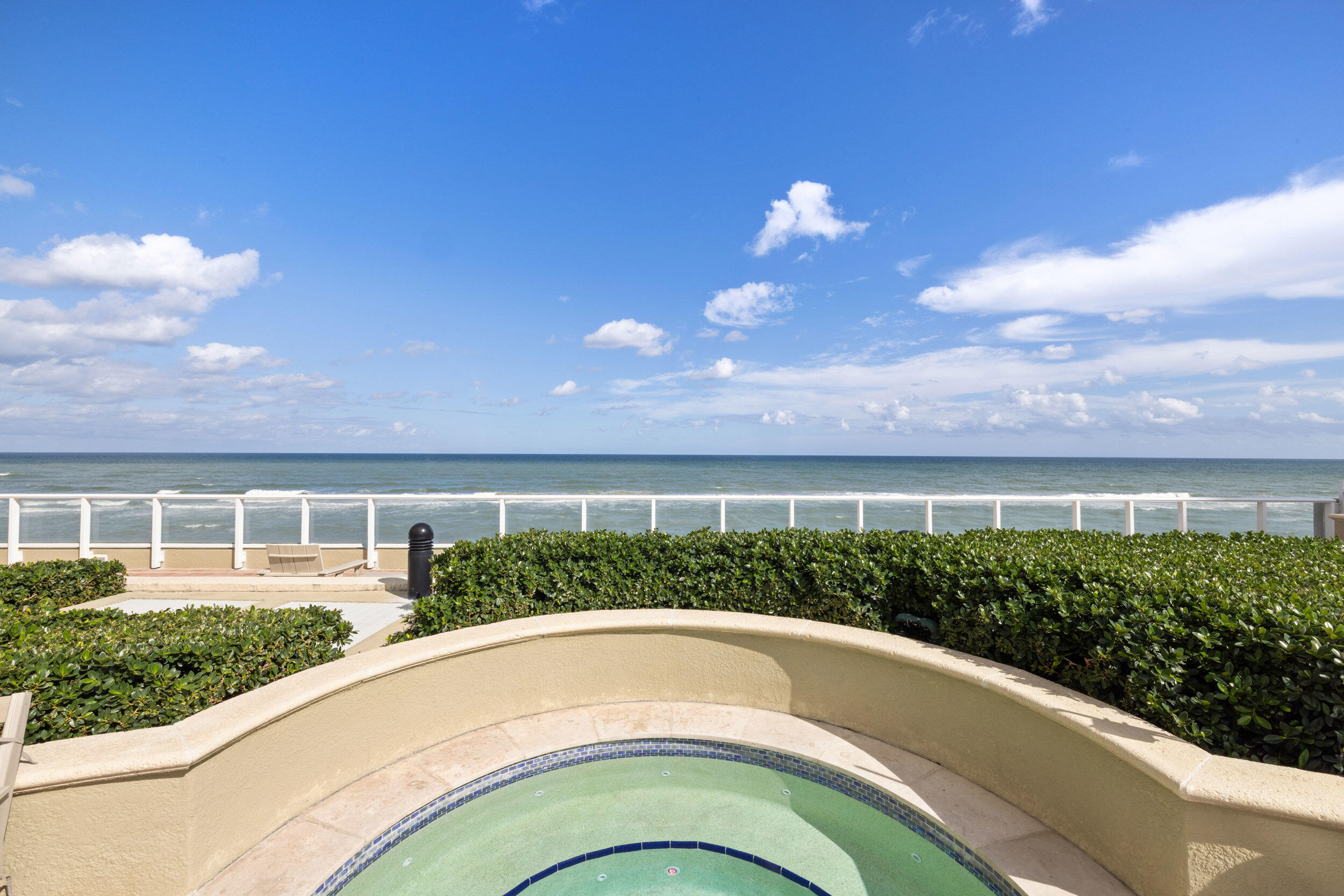 5050 North Ocean Drive, Unit 1502 Singer Island, FL 33404 - Photo 44 of 56 a view of a house with a garden and a yard