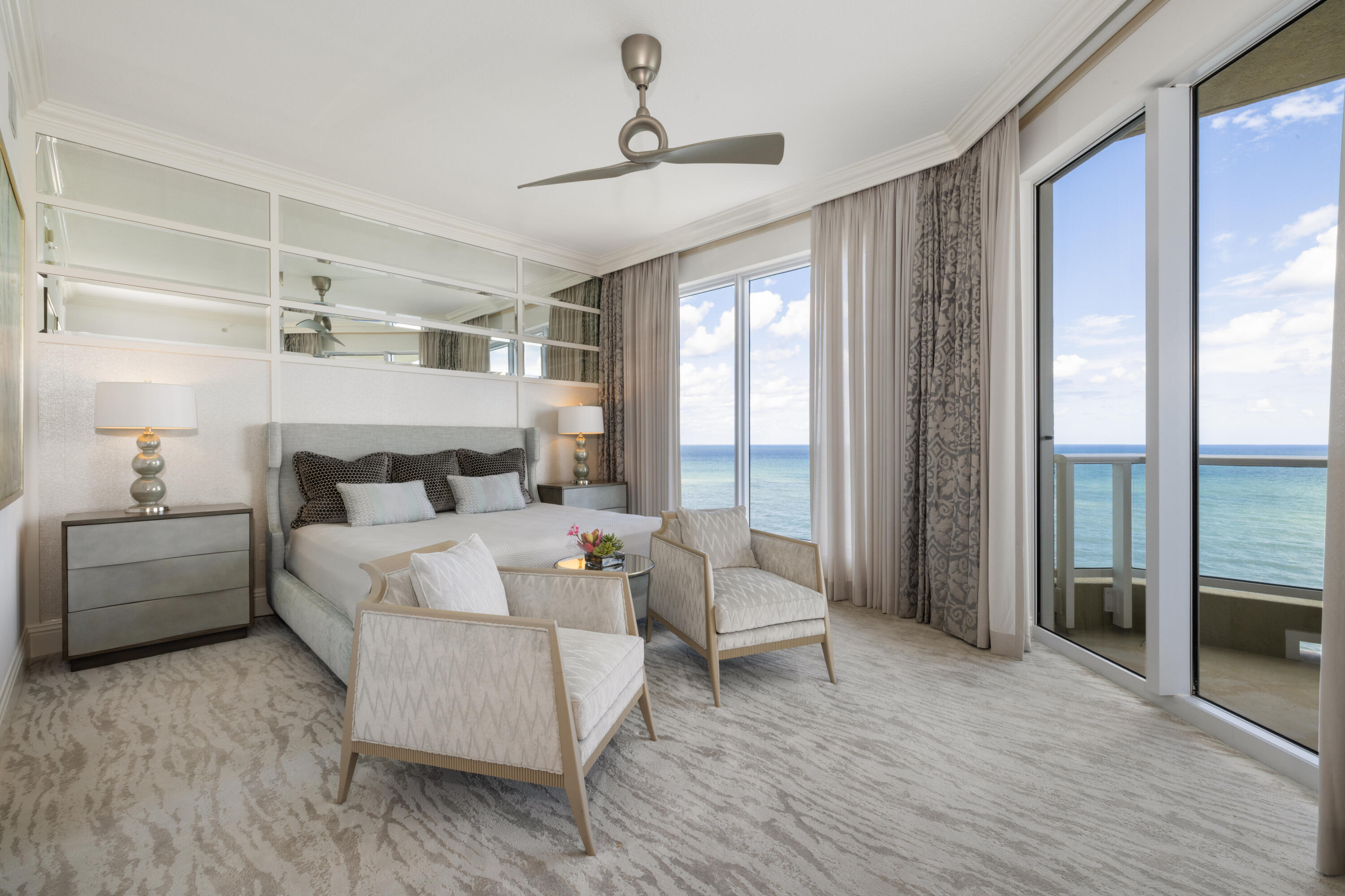 5050 North Ocean Drive, Unit 1502 Singer Island, FL 33404 - Photo 5 of 56 a living room with furniture and a large window
