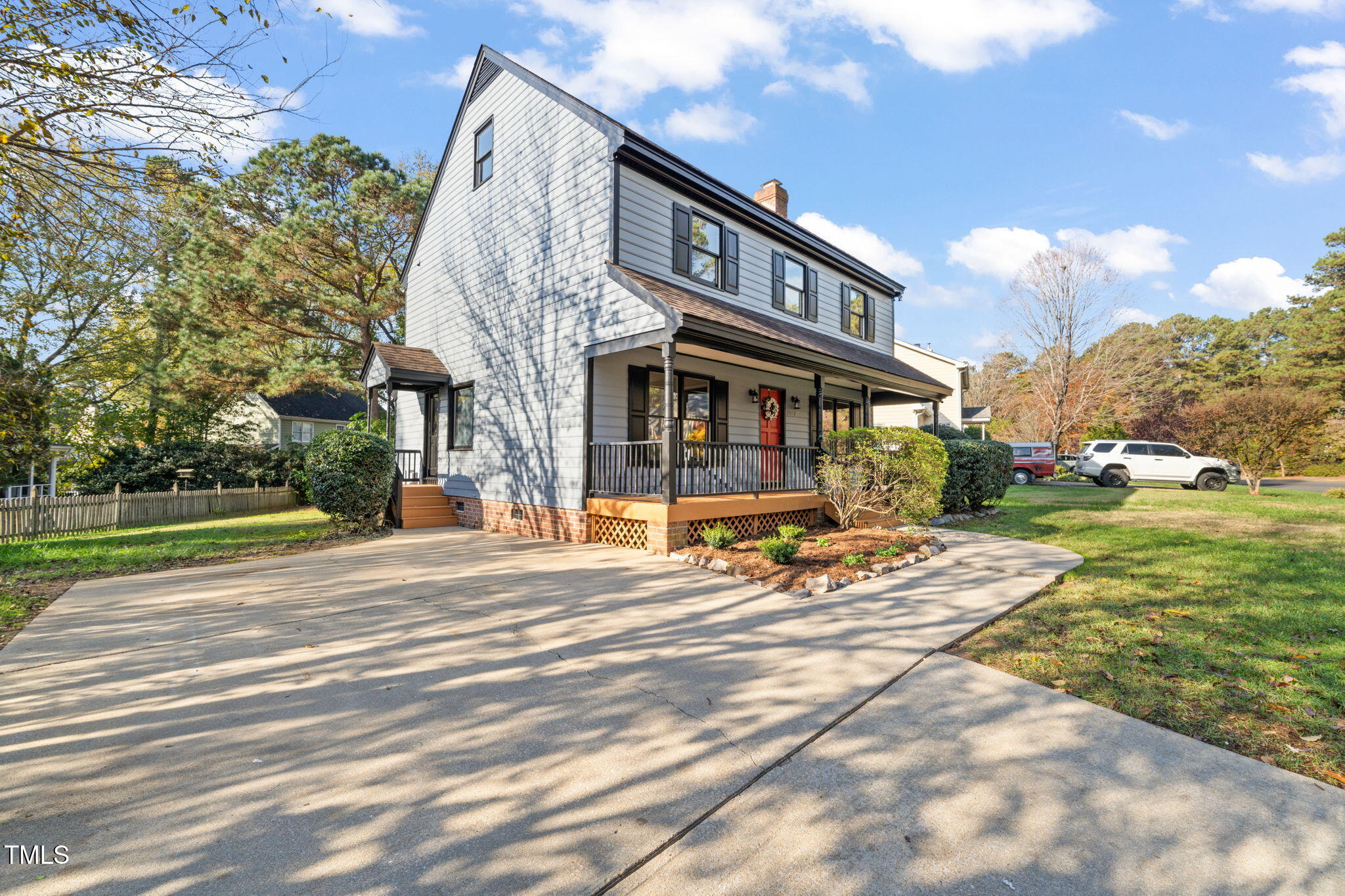 2512 Scouting Trail Raleigh, NC 27615 - Photo 2 of 36 a view of a building with a yard