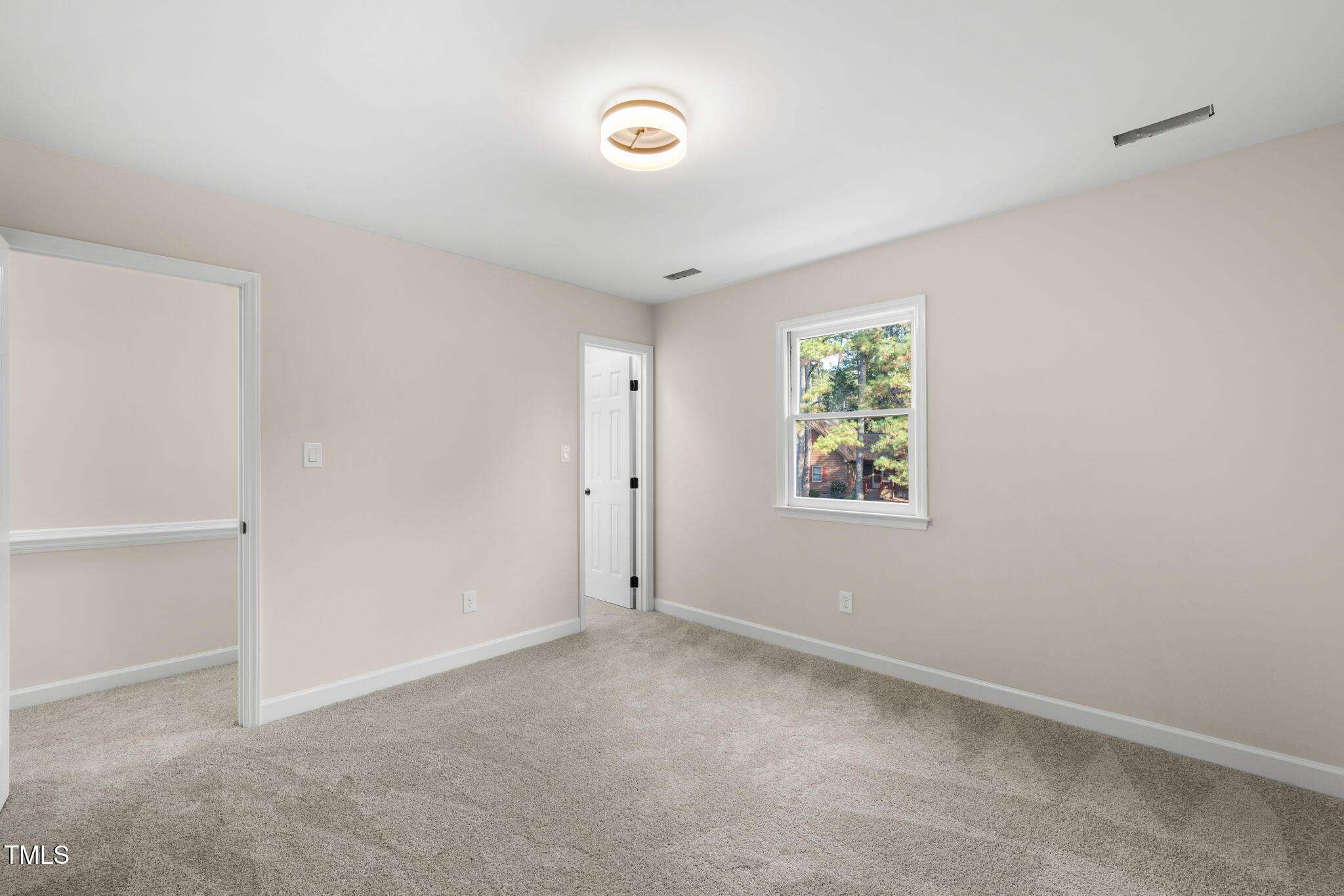 2512 Scouting Trail Raleigh, NC 27615 - Photo 23 of 36 a view of an empty room with a window