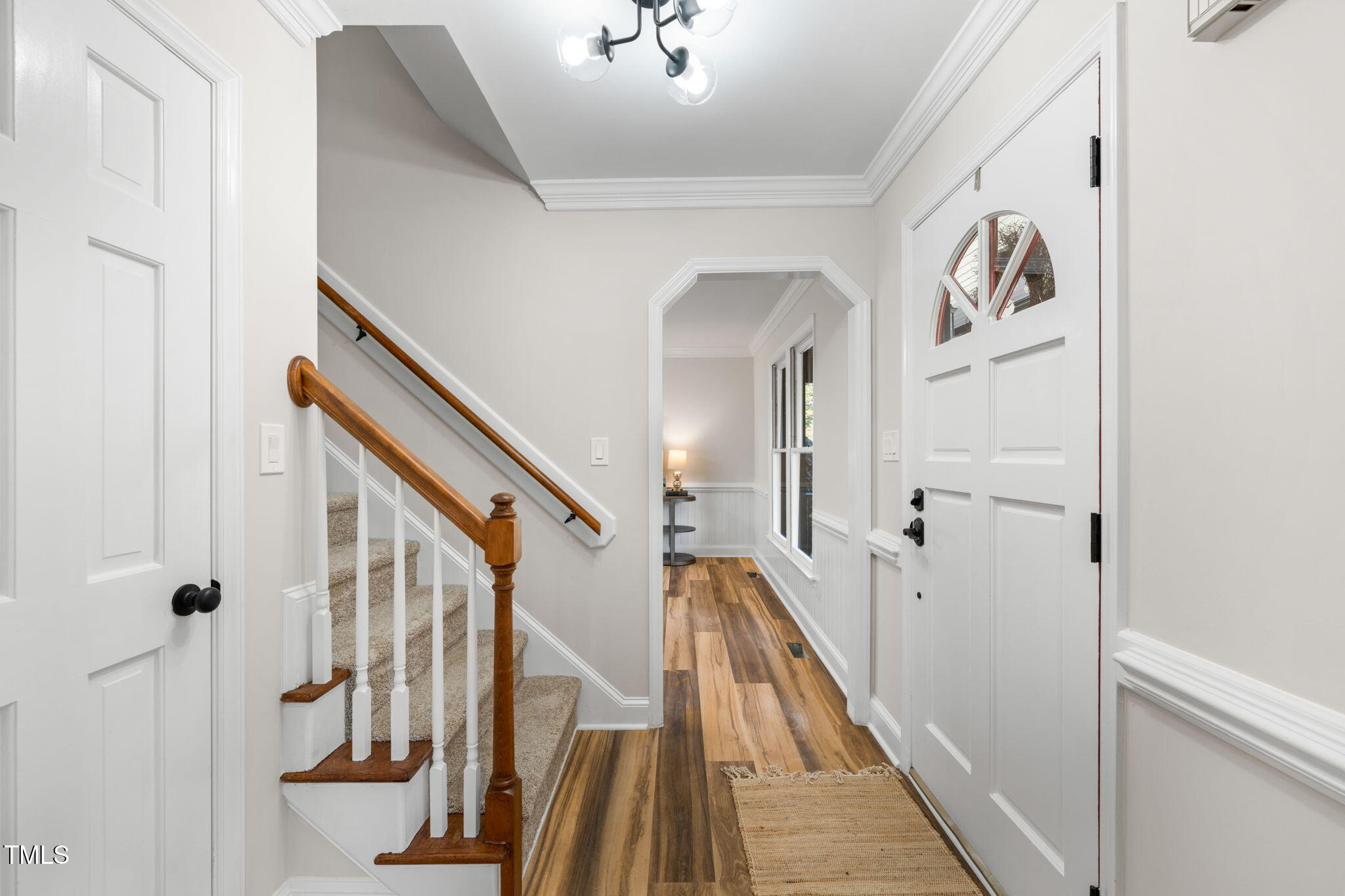 2512 Scouting Trail Raleigh, NC 27615 - Photo 29 of 36 a view of staircase with lots of frames on wall and stairs