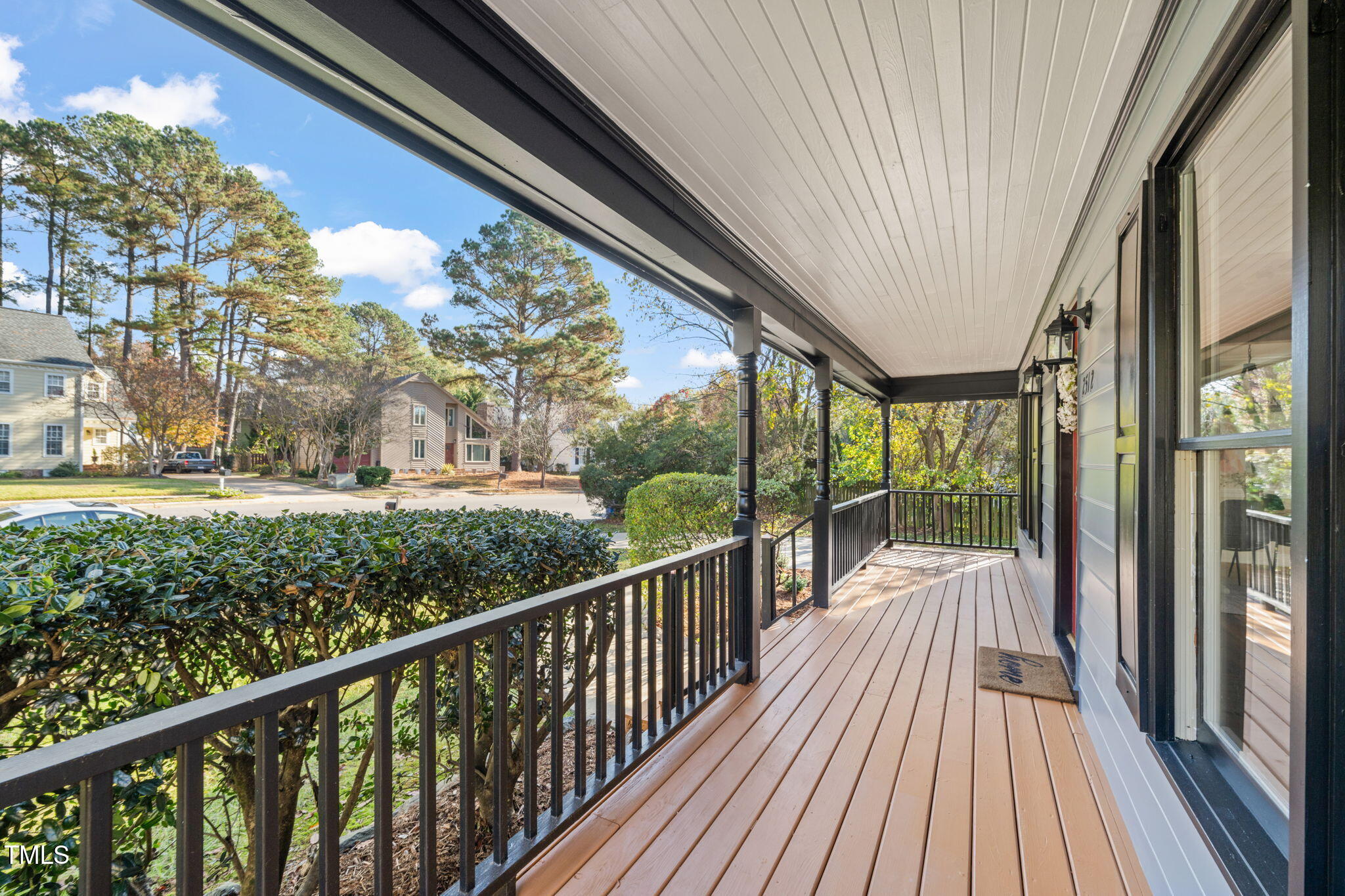 2512 Scouting Trail Raleigh, NC 27615 - Photo 36 of 36 a view of a balcony with furniture and wooden floor