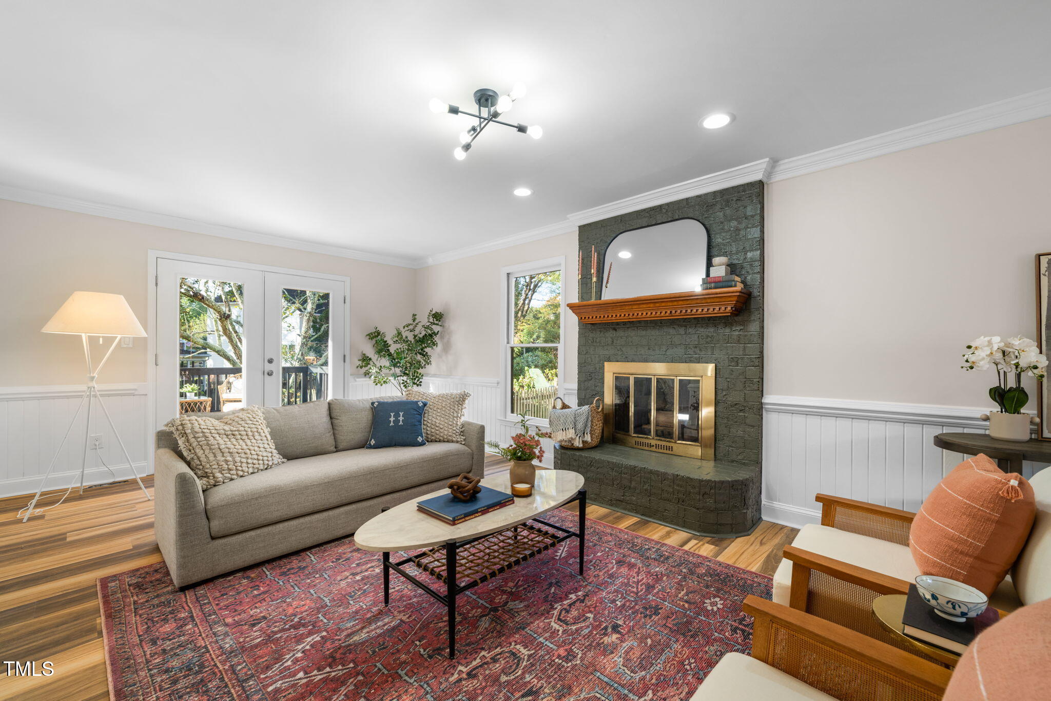 2512 Scouting Trail Raleigh, NC 27615 - Photo 6 of 36 a living room with furniture a fireplace and a window