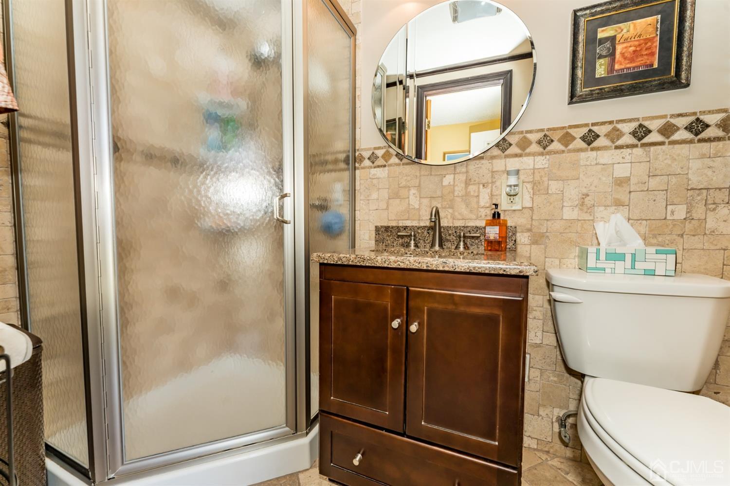 41 Trafalgar Drive Colonia, NJ 07067 - Photo 24 of 40 a bathroom with a sink a toilet and shower