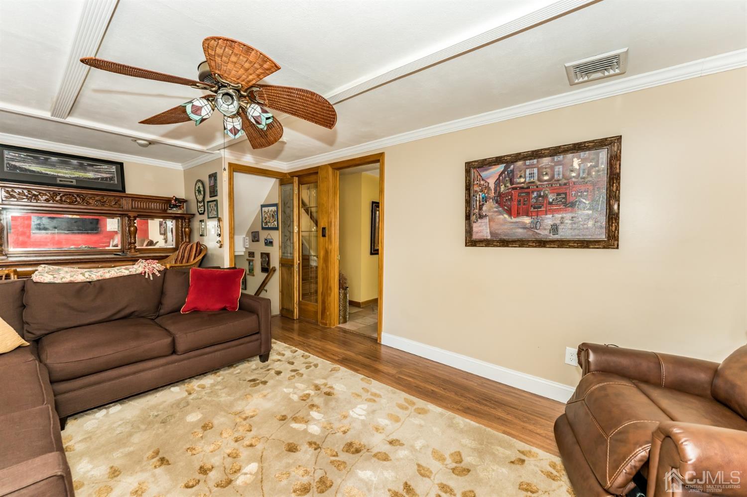 41 Trafalgar Drive Colonia, NJ 07067 - Photo 4 of 40 a living room with furniture and a flat screen tv