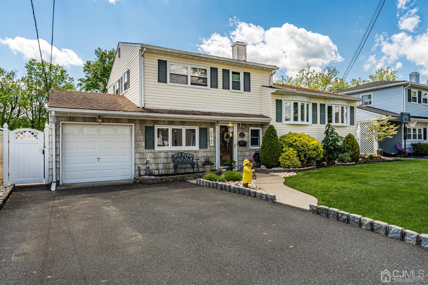41 Trafalgar Drive Colonia, NJ 07067 - Photo 40 of 40 a view of a house with a garden and pathway