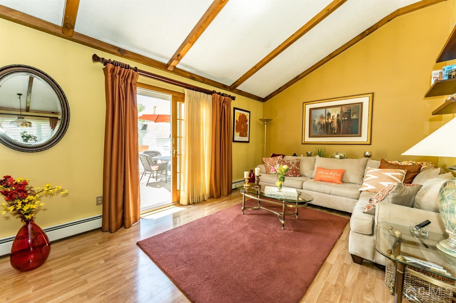 41 Trafalgar Drive Colonia, NJ 07067 - Photo 7 of 40 a living room with furniture and a large window