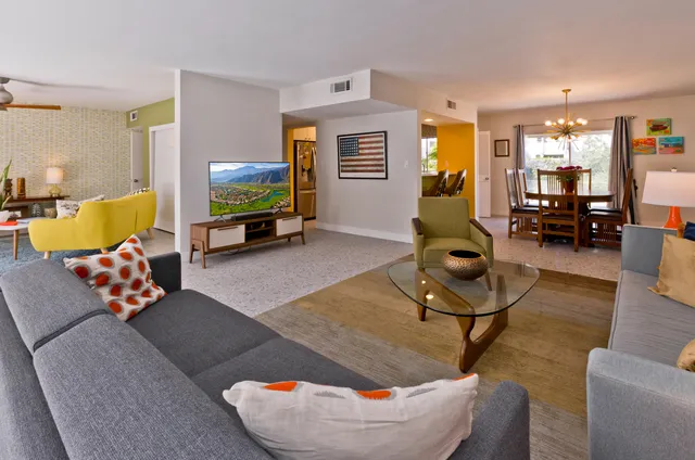 a view of an empty room with glass door