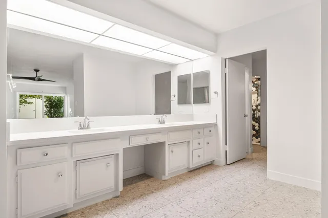 a view of swimming pool with outdoor seating and yard