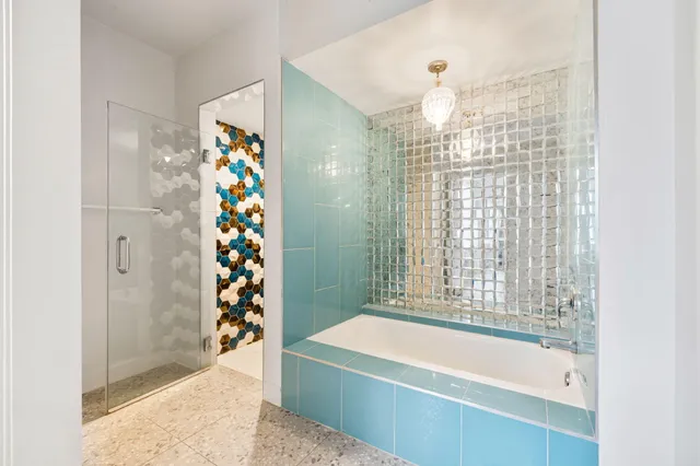 a view of a swimming pool with a lounge chairs