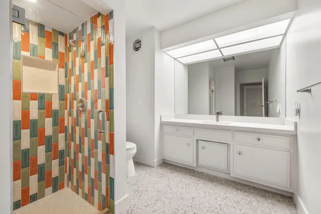 a swimming pool with outdoor seating and yard