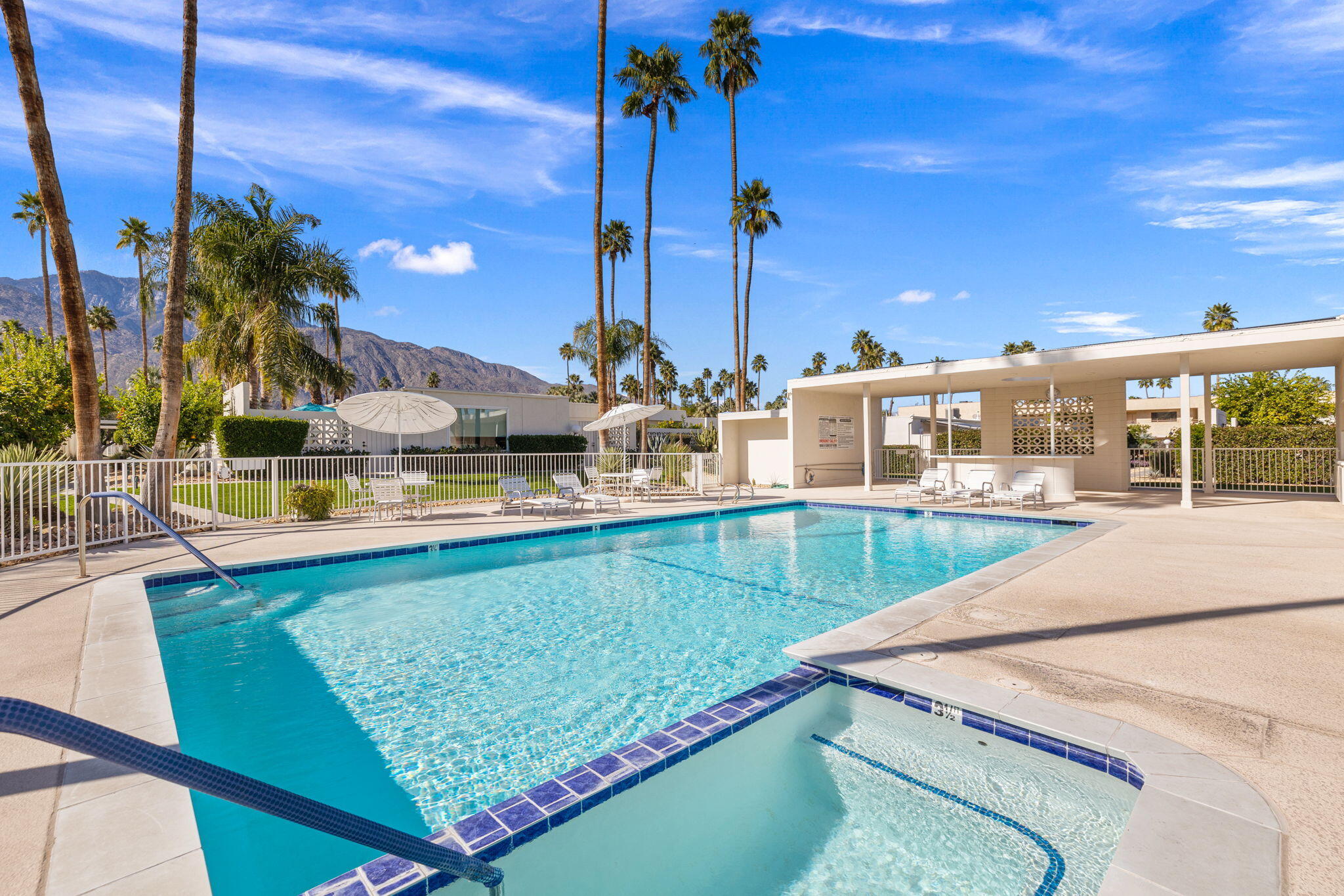1810 Sandcliff Road Palm Springs, CA 92264 - Photo 50 of 55 a view of a backyard and swimming pool