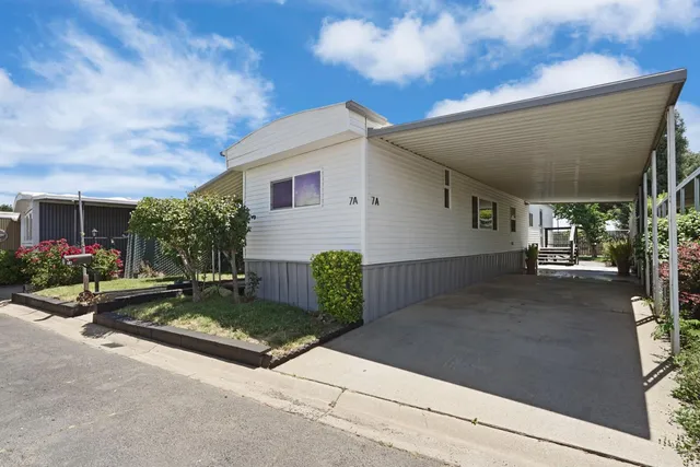 a view of a house with garage