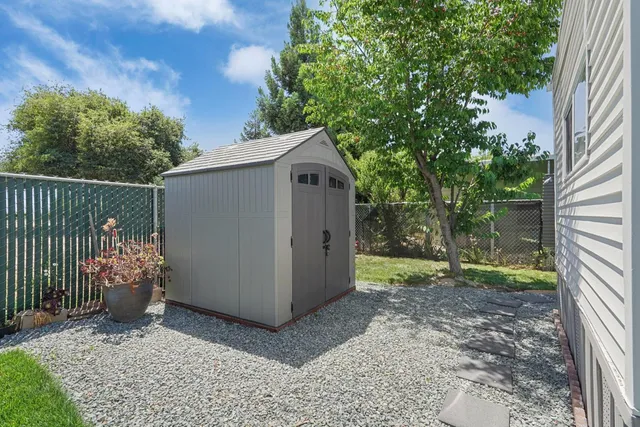 a view of backyard with green space