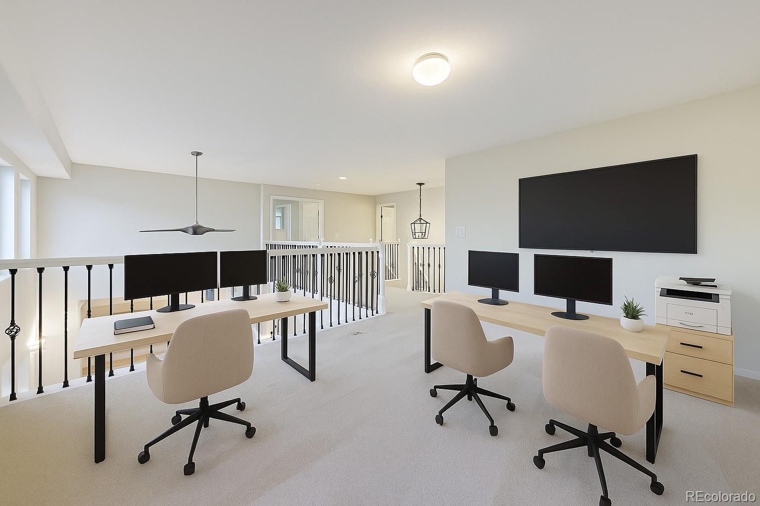 13867 Fillmore Street Thornton, CO 80602 - Photo 7 of 24 a view of a workspace with furniture