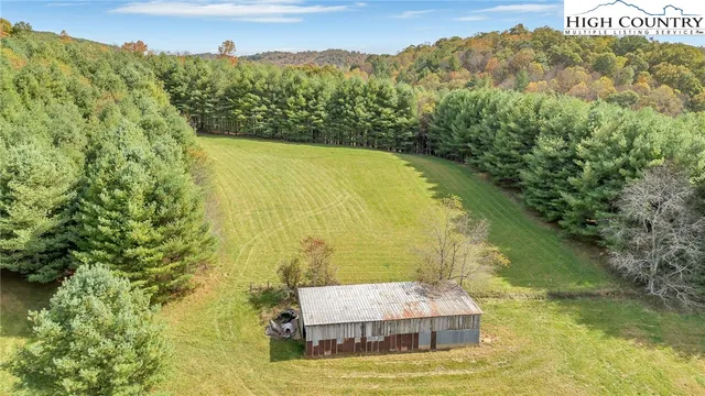 a view of three pool of water with mountain view