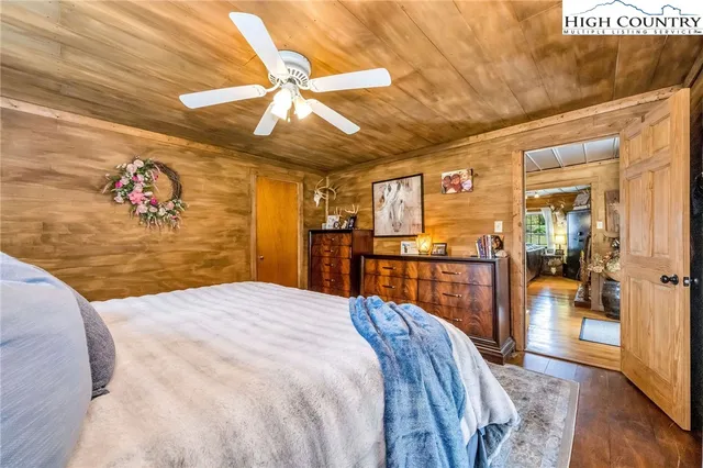 a bathroom with a sink mirror and next to a window