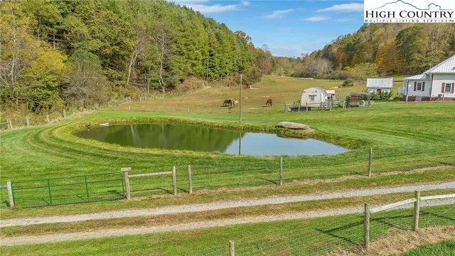 a view of a garden with an outdoor space