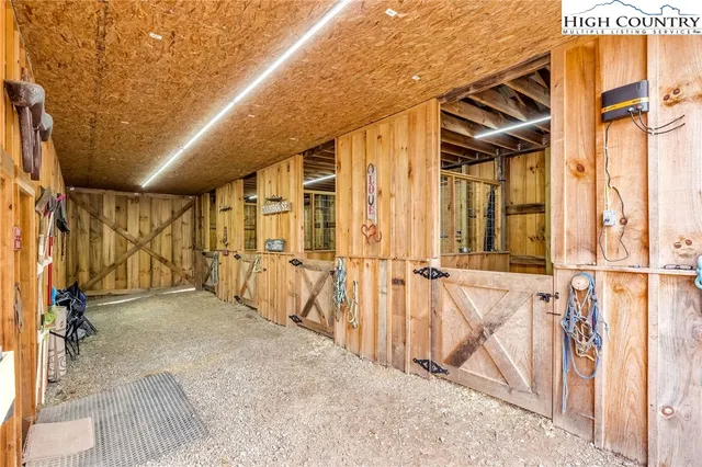 a view of a chairs and table in a patio