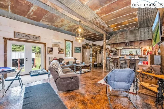 a view of a garage with parked cars