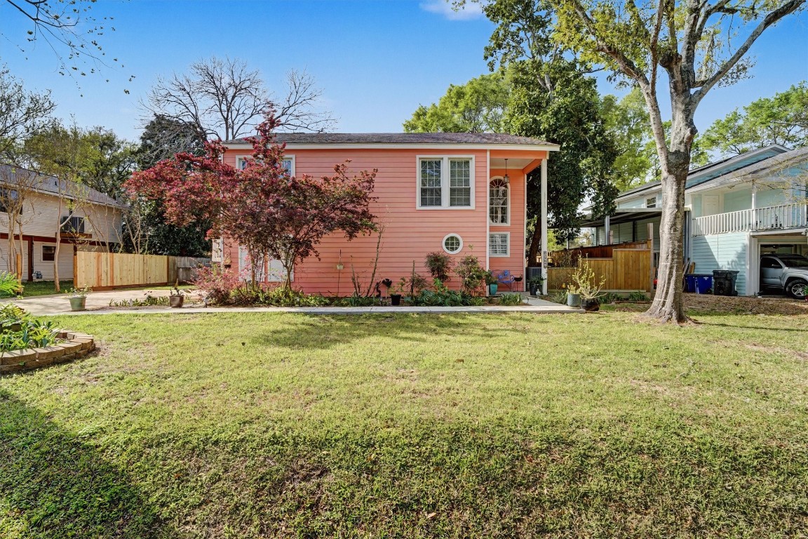 2205 Mission Street Kemah, TX 77565 - Photo 31 of 33 Charming exterior of the home featuring fresh paint, mature landscaping, and a spacious front yard.