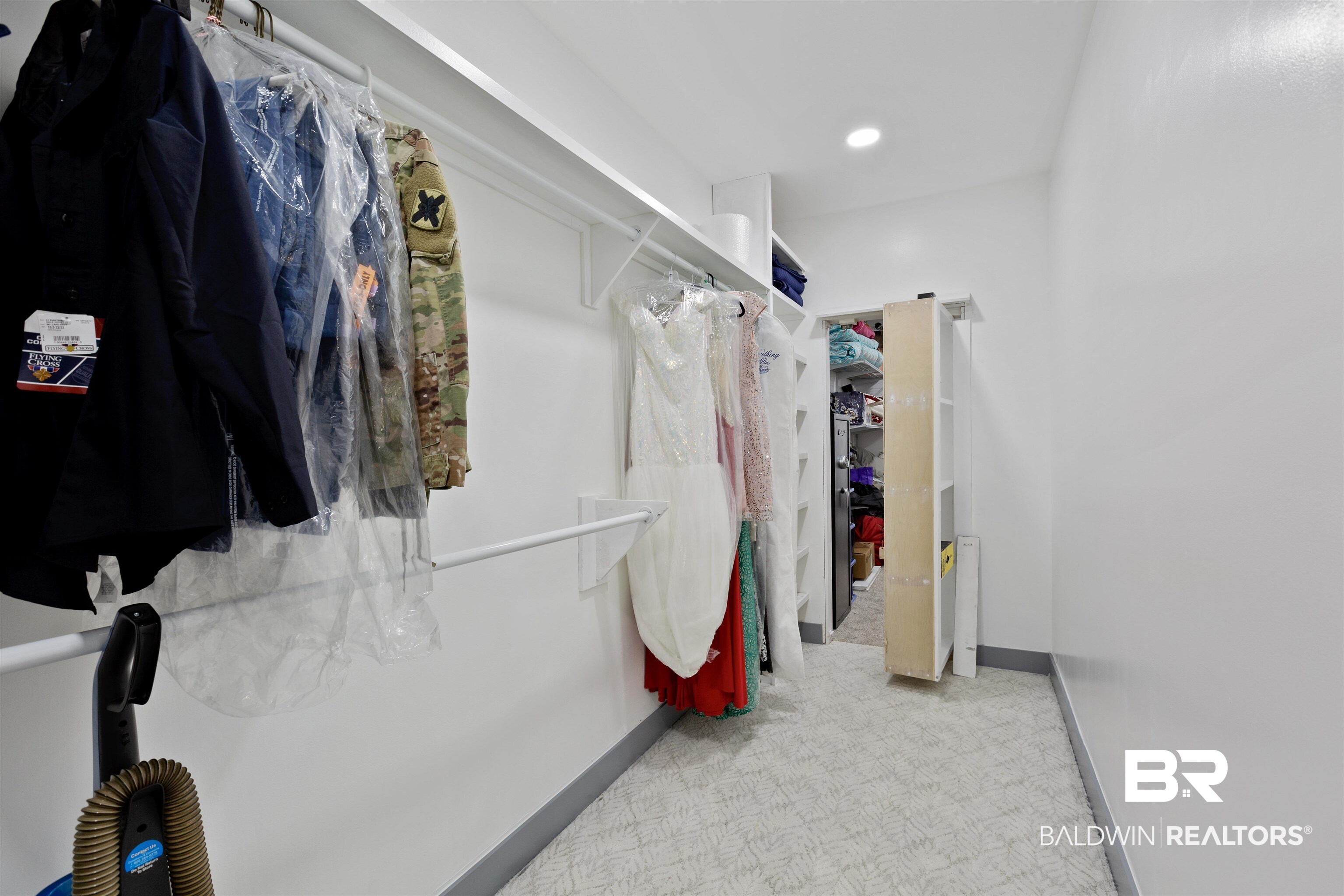 4383 Millhouse Road Gulf Shores, AL 36542 - Photo 37 of 43 This is a hidden closet that is fob control