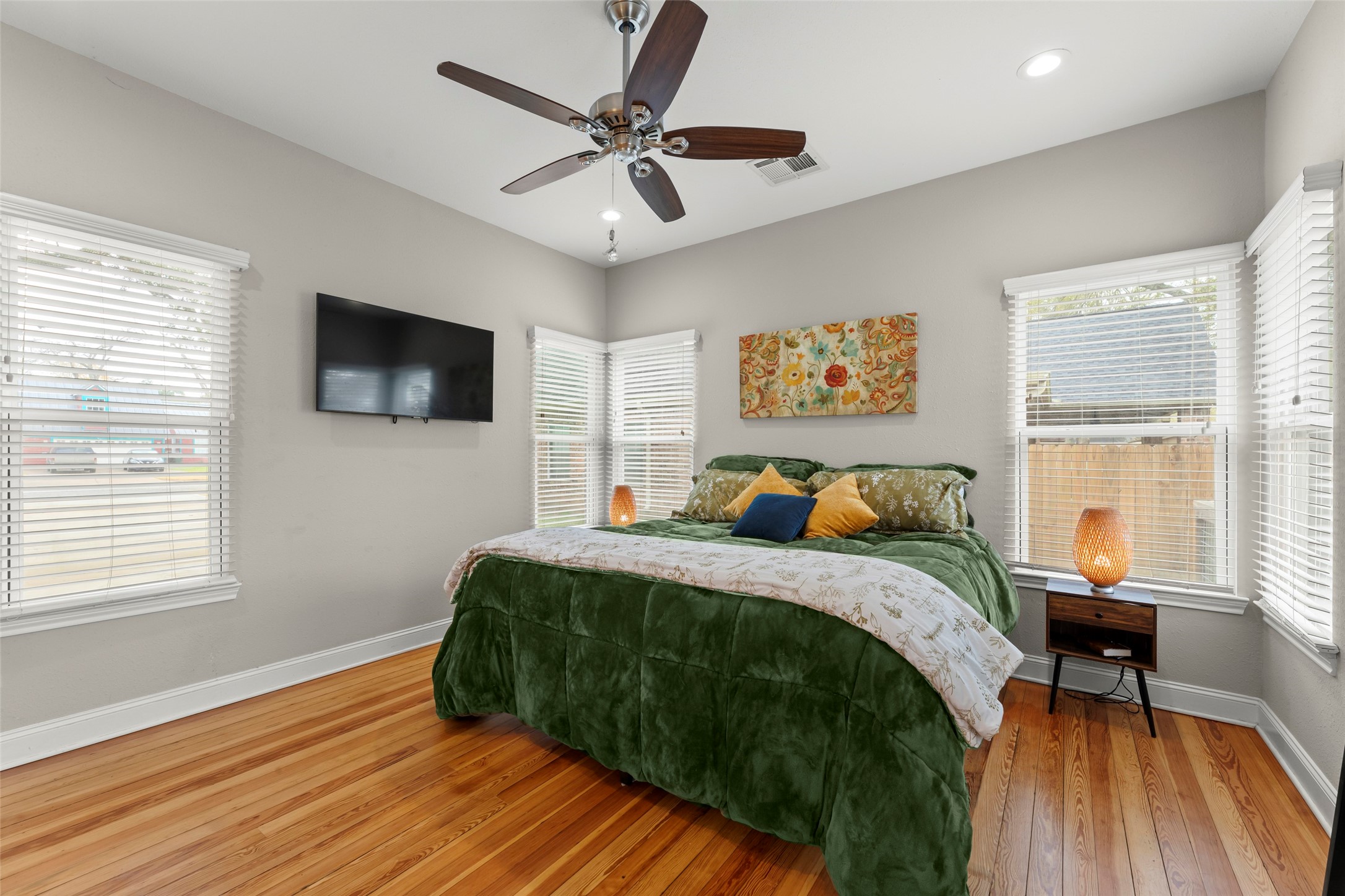 711 4th Street Sealy, TX 77474 - Photo 18 of 37 a bed room with a bed window and a television
