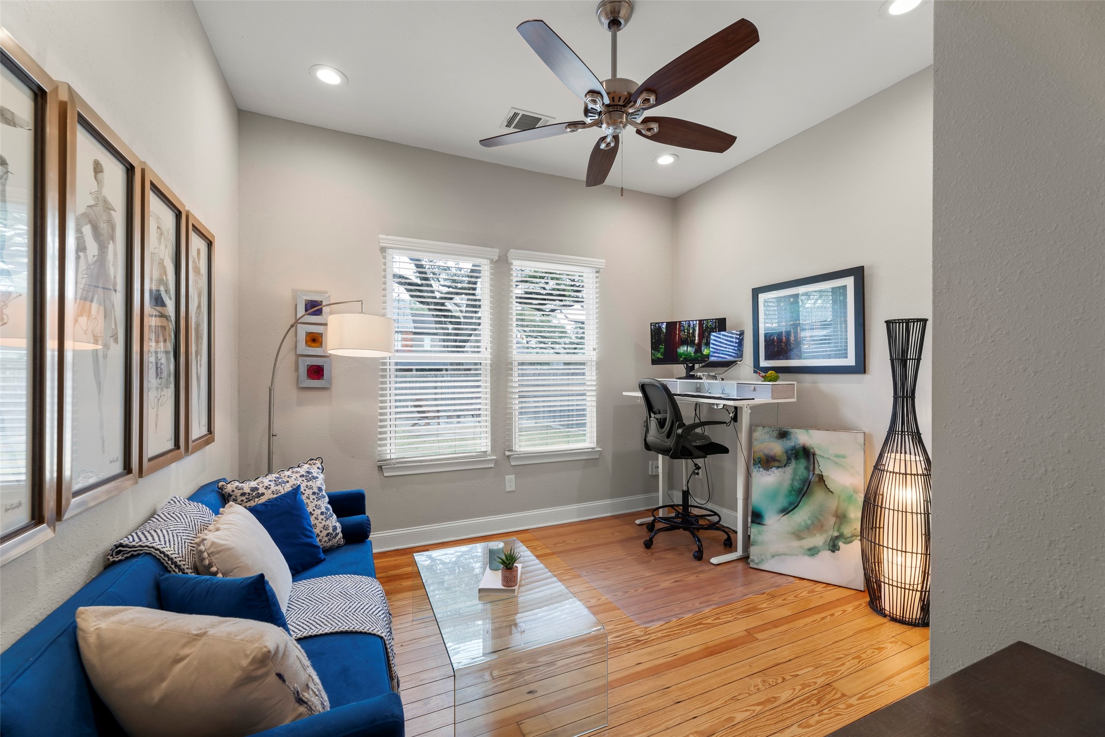 711 4th Street Sealy, TX 77474 - Photo 28 of 37 a living room with furniture a window and a flat screen tv