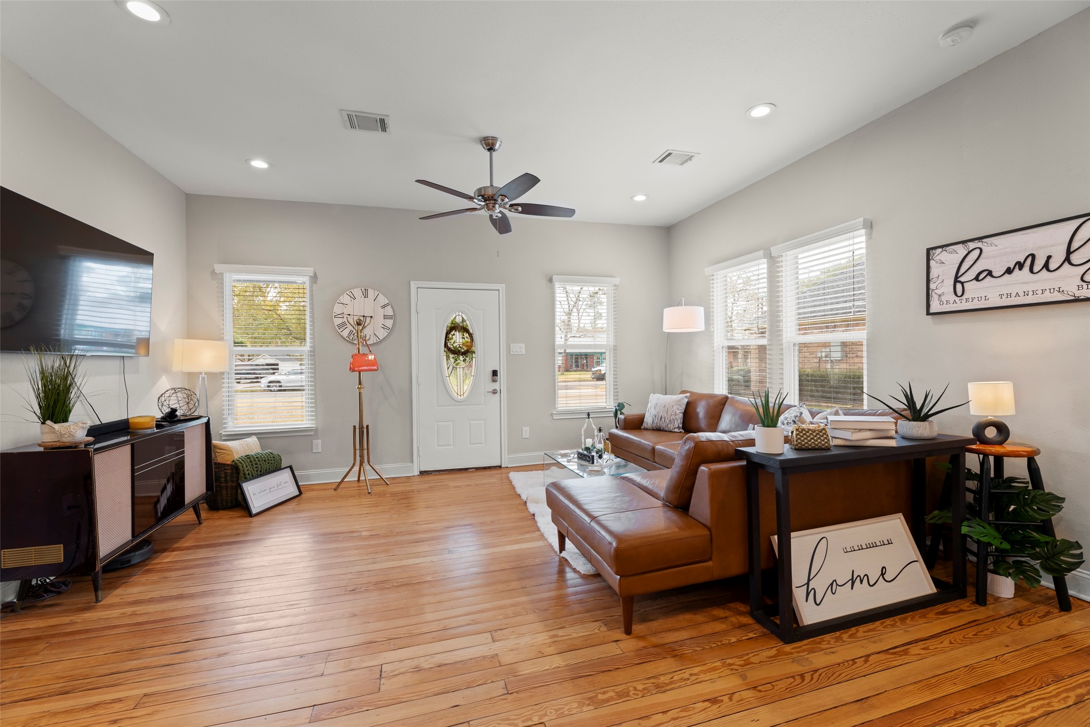 711 4th Street Sealy, TX 77474 - Photo 7 of 37 a living room with furniture and a flat screen tv