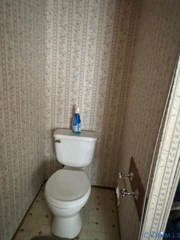 21663 Storys Station Road Franklin, VA 23851 - Photo 11 of 22 a bathroom with a toilet and a sink