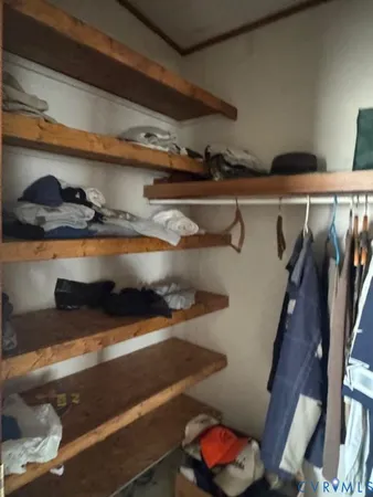 a close view of shoes stand and cabinets