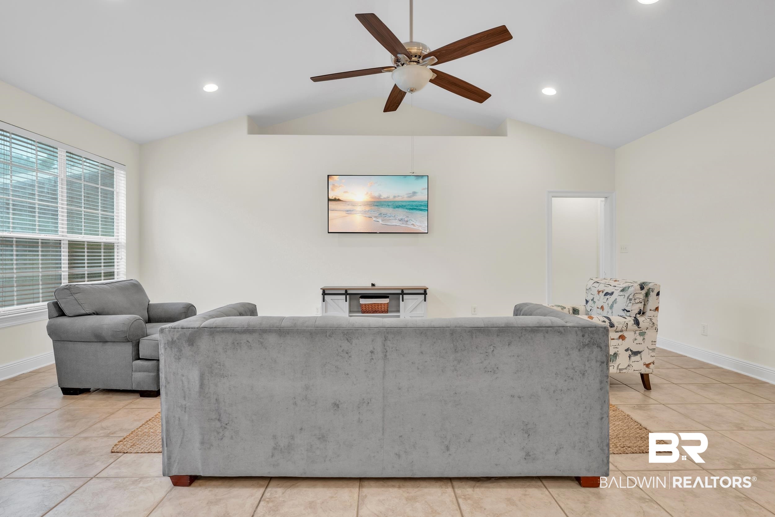 4606 Osprey Drive Orange Beach, AL 36561 - Photo 15 of 44 Living room featuring lofted ceiling, ceiling fan, light tile patterned floors, and recessed lighting