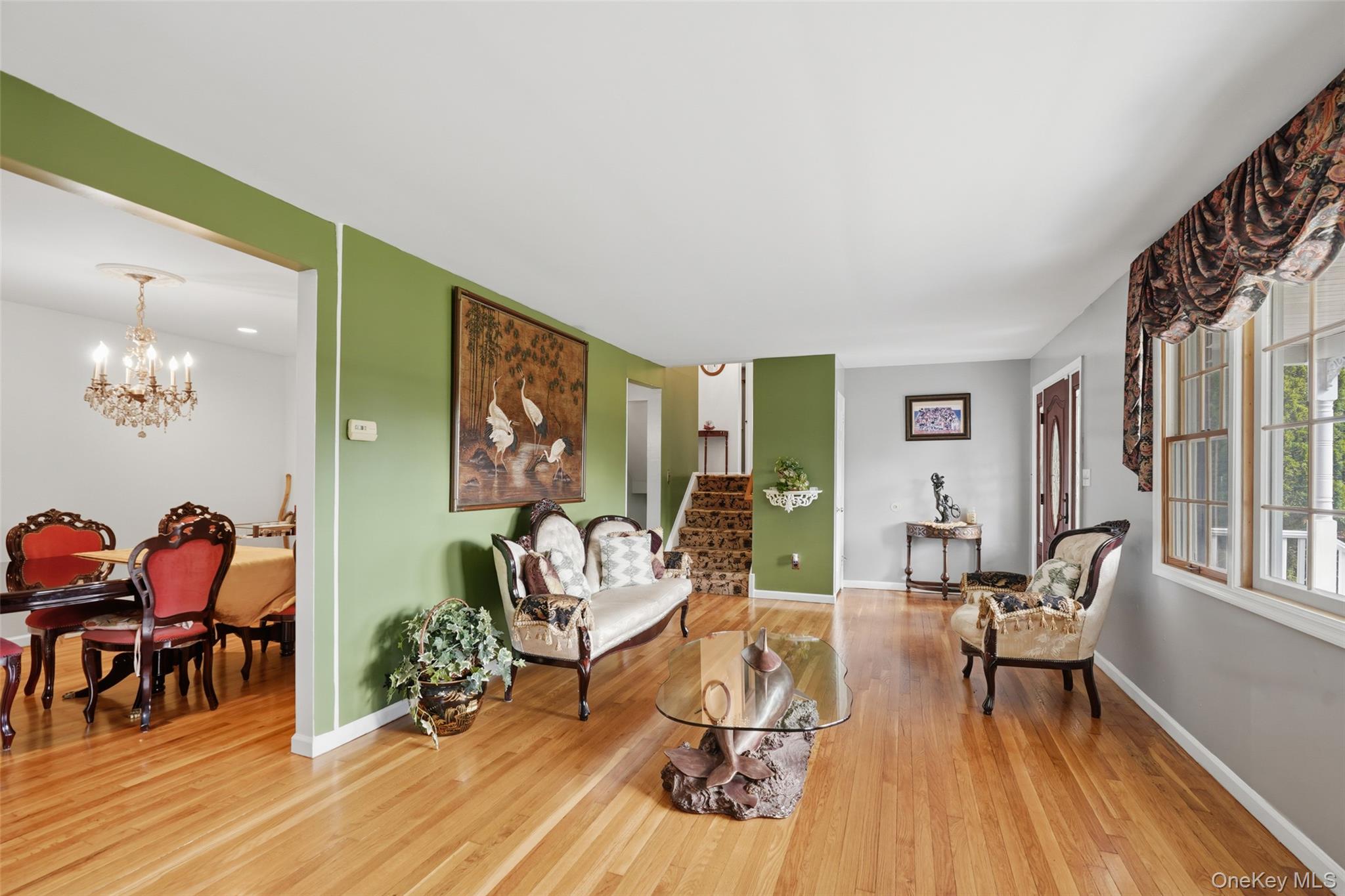 623 Cardinal Road Cortlandt Manor, NY 10567 - Photo 6 of 40 a living room with furniture and wooden floor