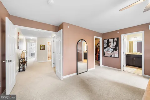 a view of a livingroom with furniture and cabinet