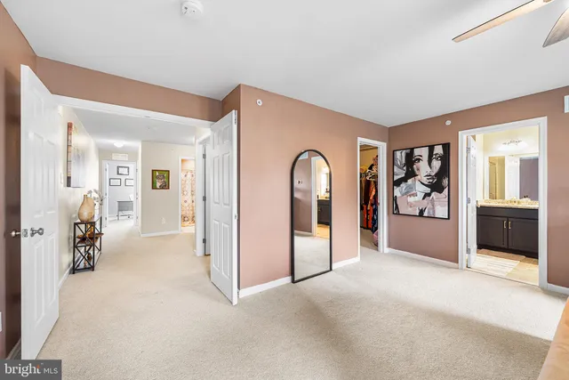 a view of a livingroom with furniture and cabinet