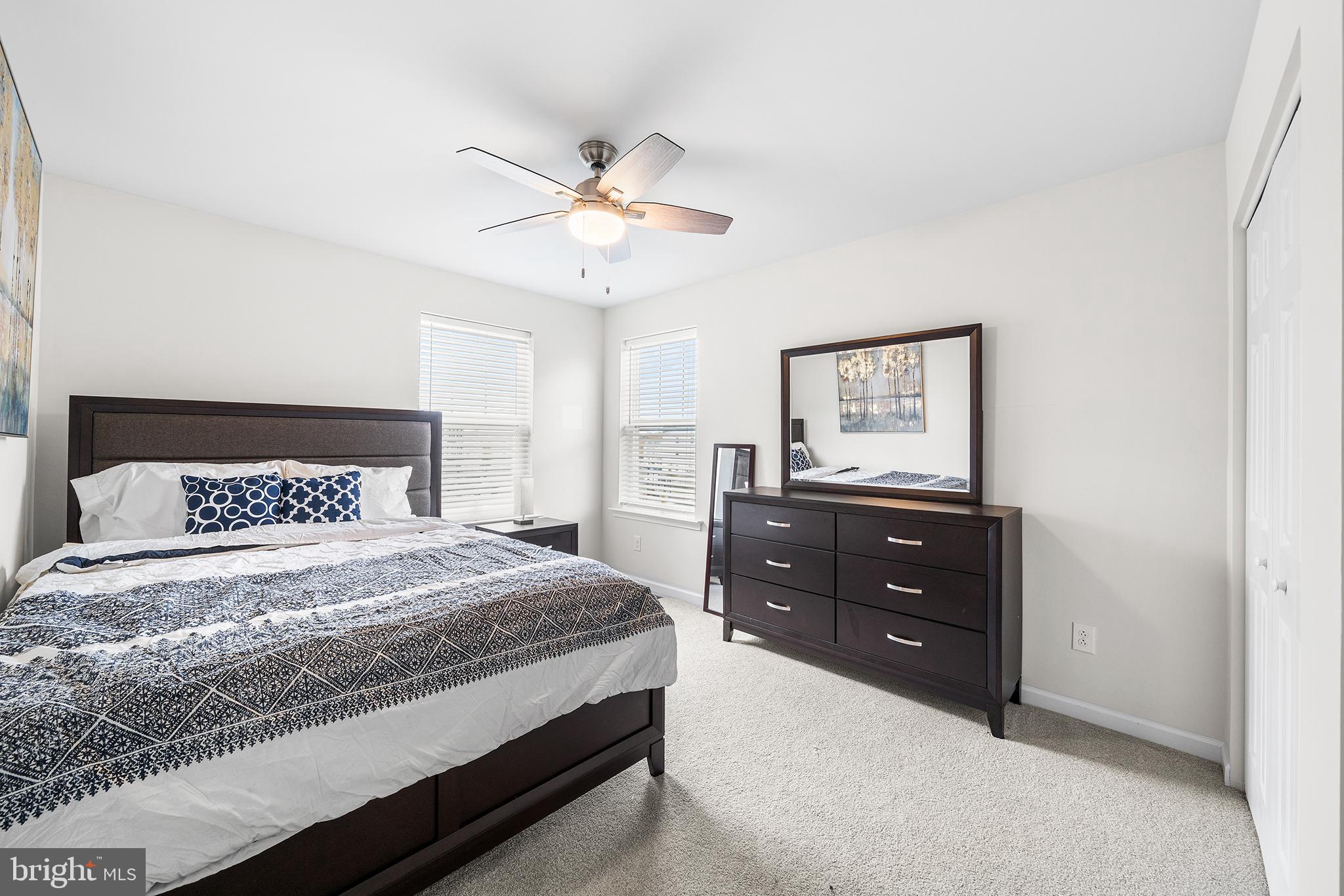 186 Spring Lane Royersford, PA 19468 - Photo 20 of 29 a bedroom with a bed and a mirror