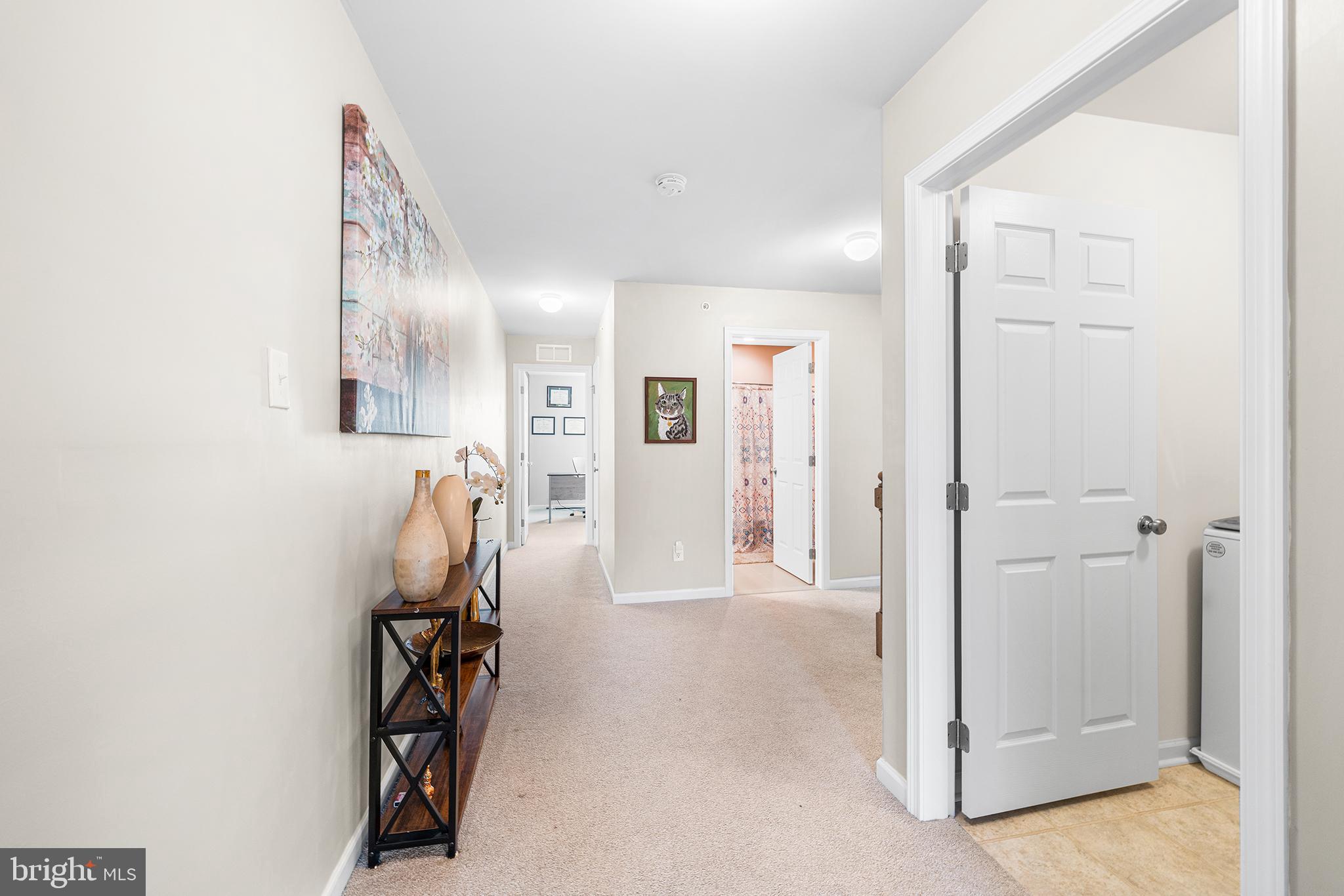 186 Spring Lane Royersford, PA 19468 - Photo 24 of 29 wooden floor with white walls and stairs