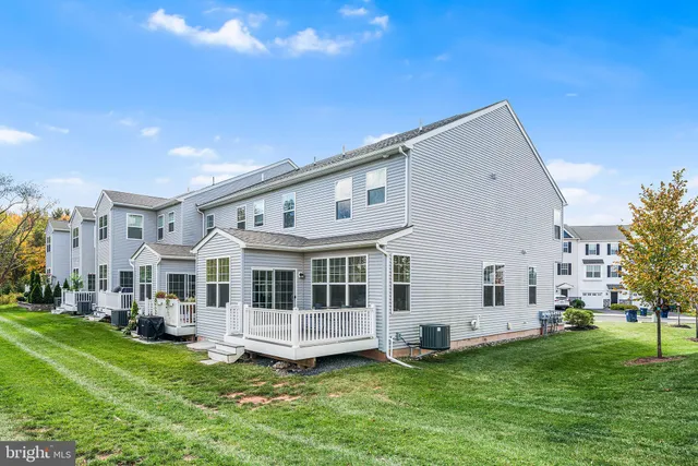 a view of a house with a big yard