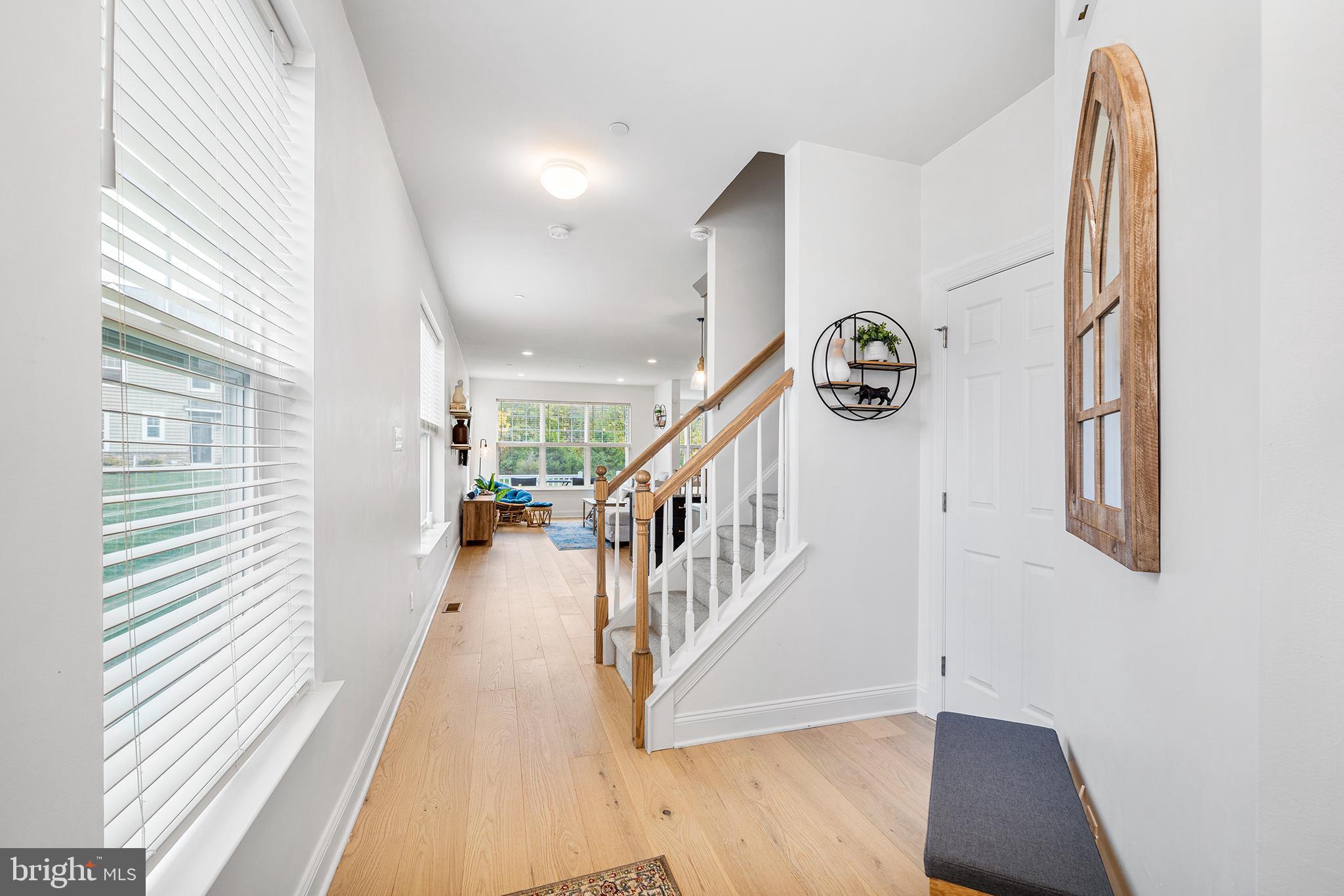 186 Spring Lane Royersford, PA 19468 - Photo 4 of 29 a view of entryway and hall with wooden floor