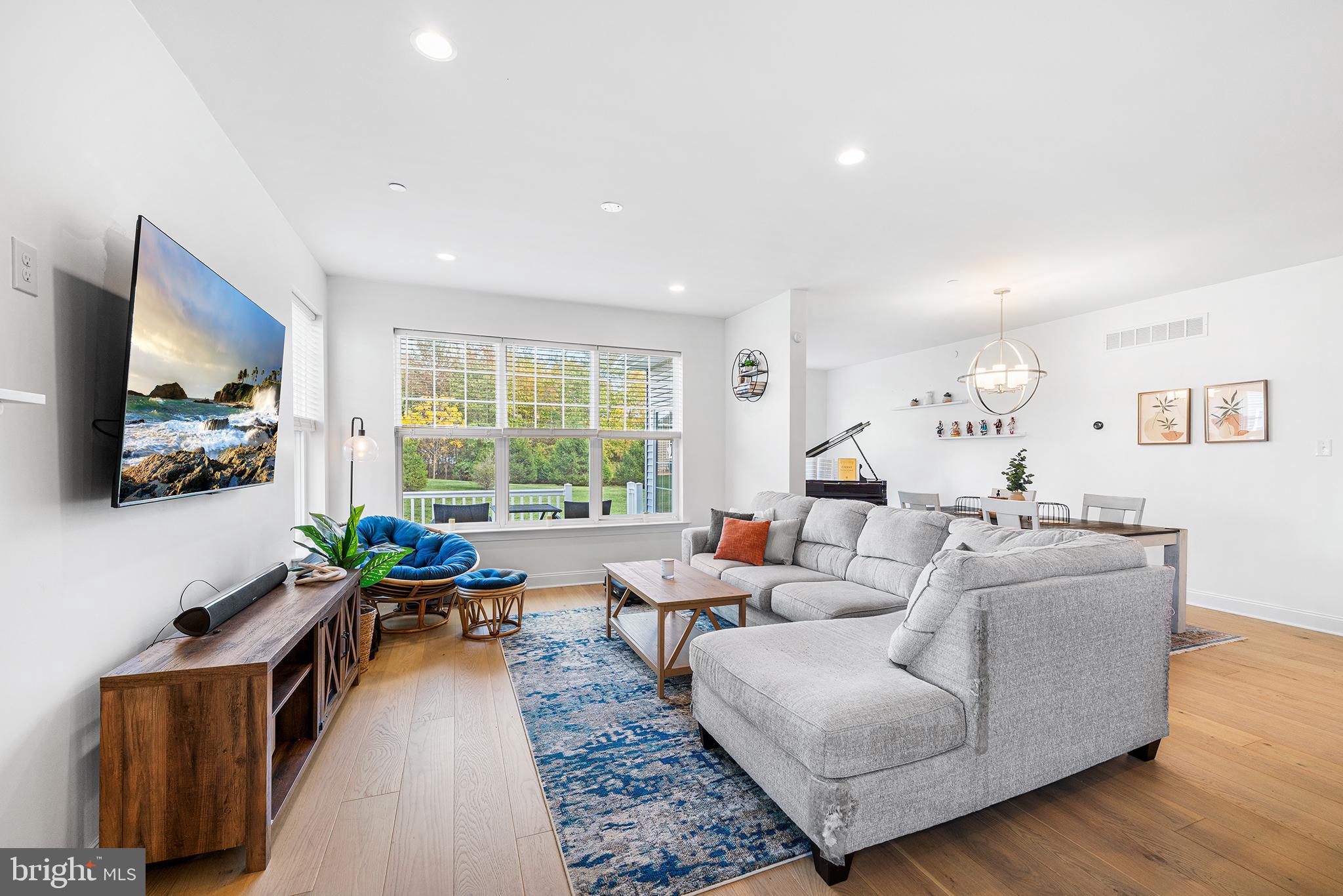 186 Spring Lane Royersford, PA 19468 - Photo 10 of 29 a living room with furniture and a flat screen tv