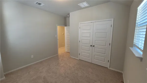 an empty room with closet