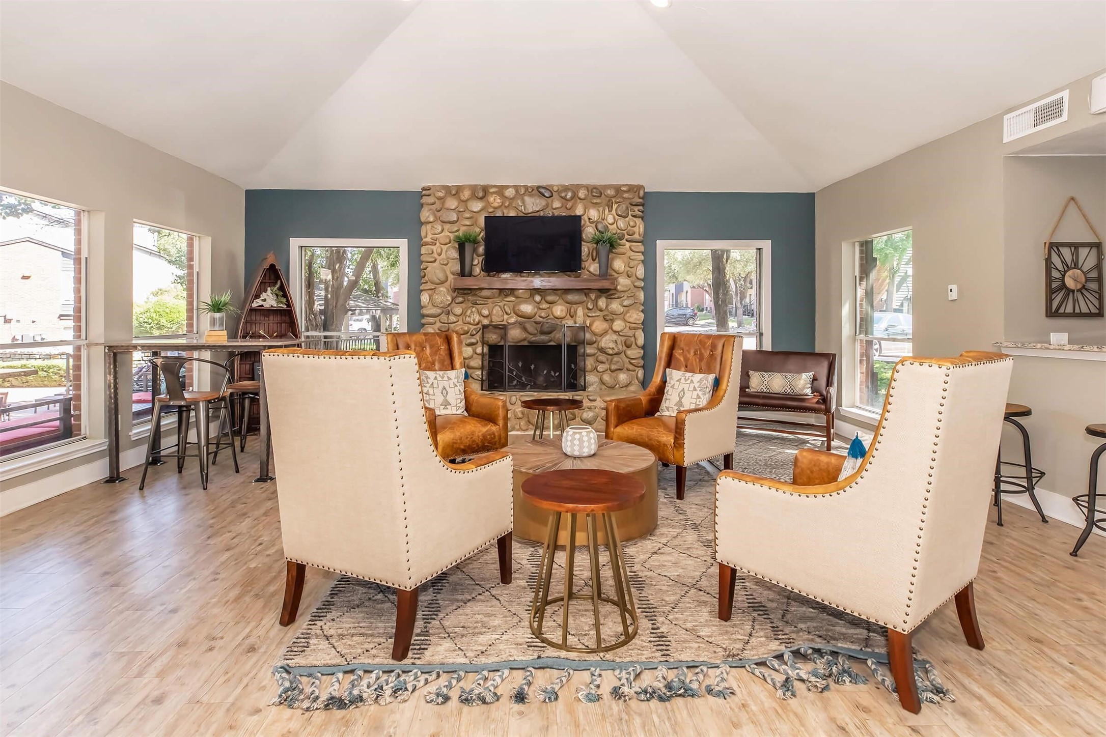 8301 Boat Club Road, Unit 815 Fort Worth, TX 76179 - Photo 10 of 36 a living room with furniture a fireplace and a flat screen tv