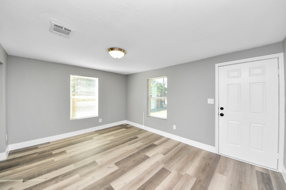 3206 Melbourne Street Houston, TX 77026 - Photo 17 of 41 a view of an empty room with a window