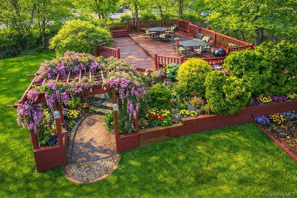 11 Valley View Road Great Neck, NY 11021 - Photo 13 of 19 a view of a garden with plants