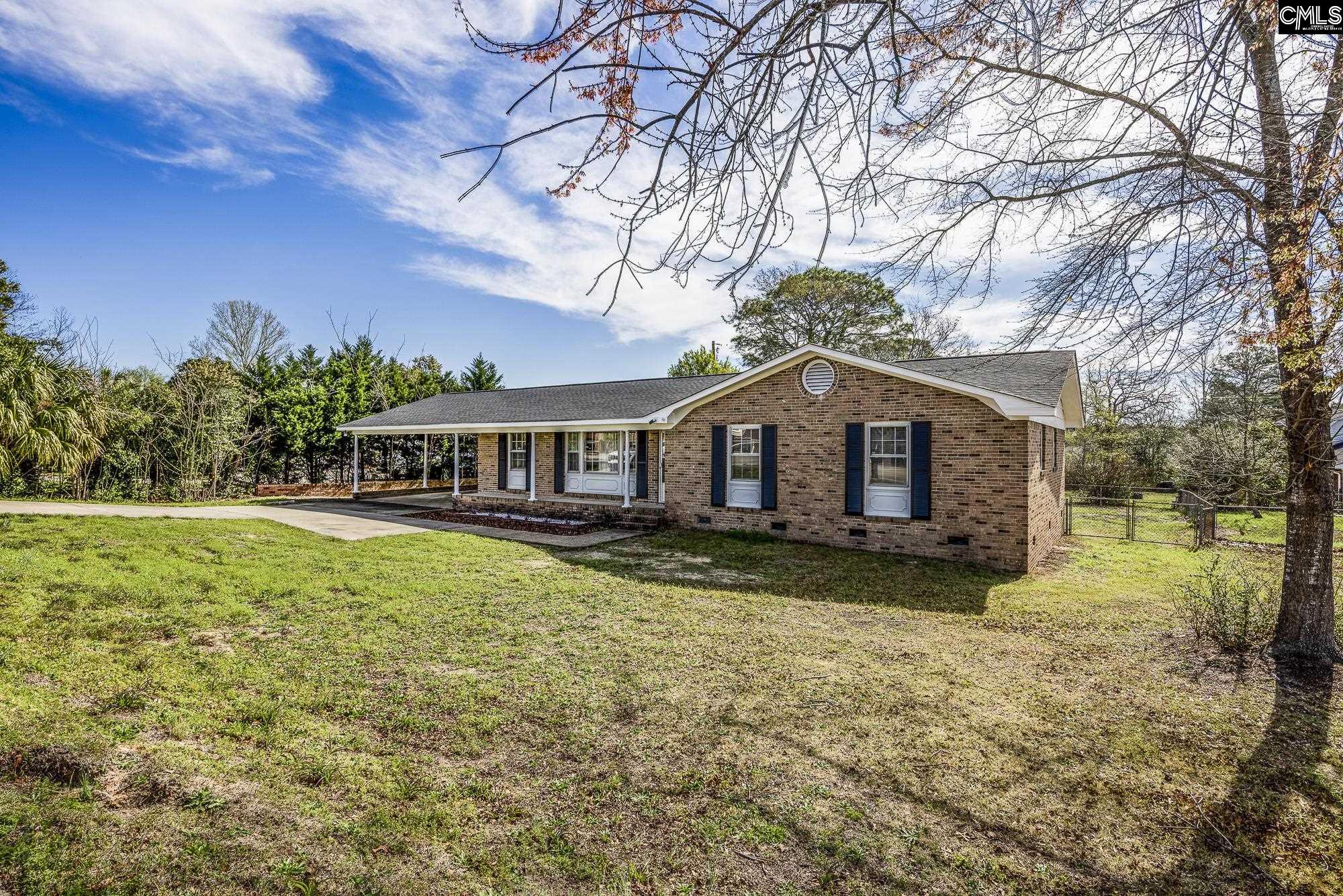 4083 Platt Springs Road West Columbia, SC 29170 - Photo 28 of 35 a front view of a house with garden