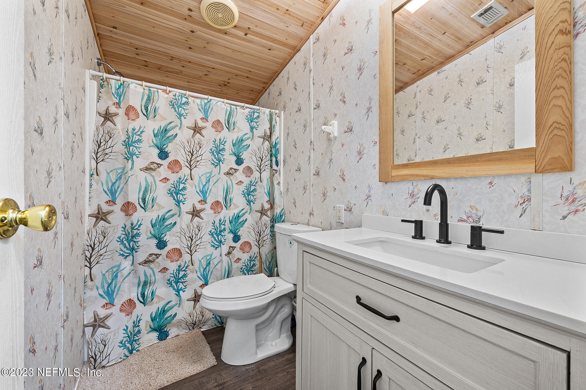 7730 Ranchette Road Keystone Heights, FL 32656 - Photo 16 of 30 a bathroom with a sink and a toilet