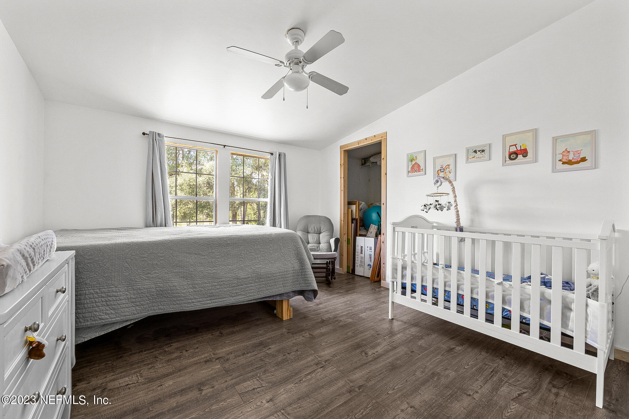 7730 Ranchette Road Keystone Heights, FL 32656 - Photo 17 of 30 a bedroom with a bed and a window