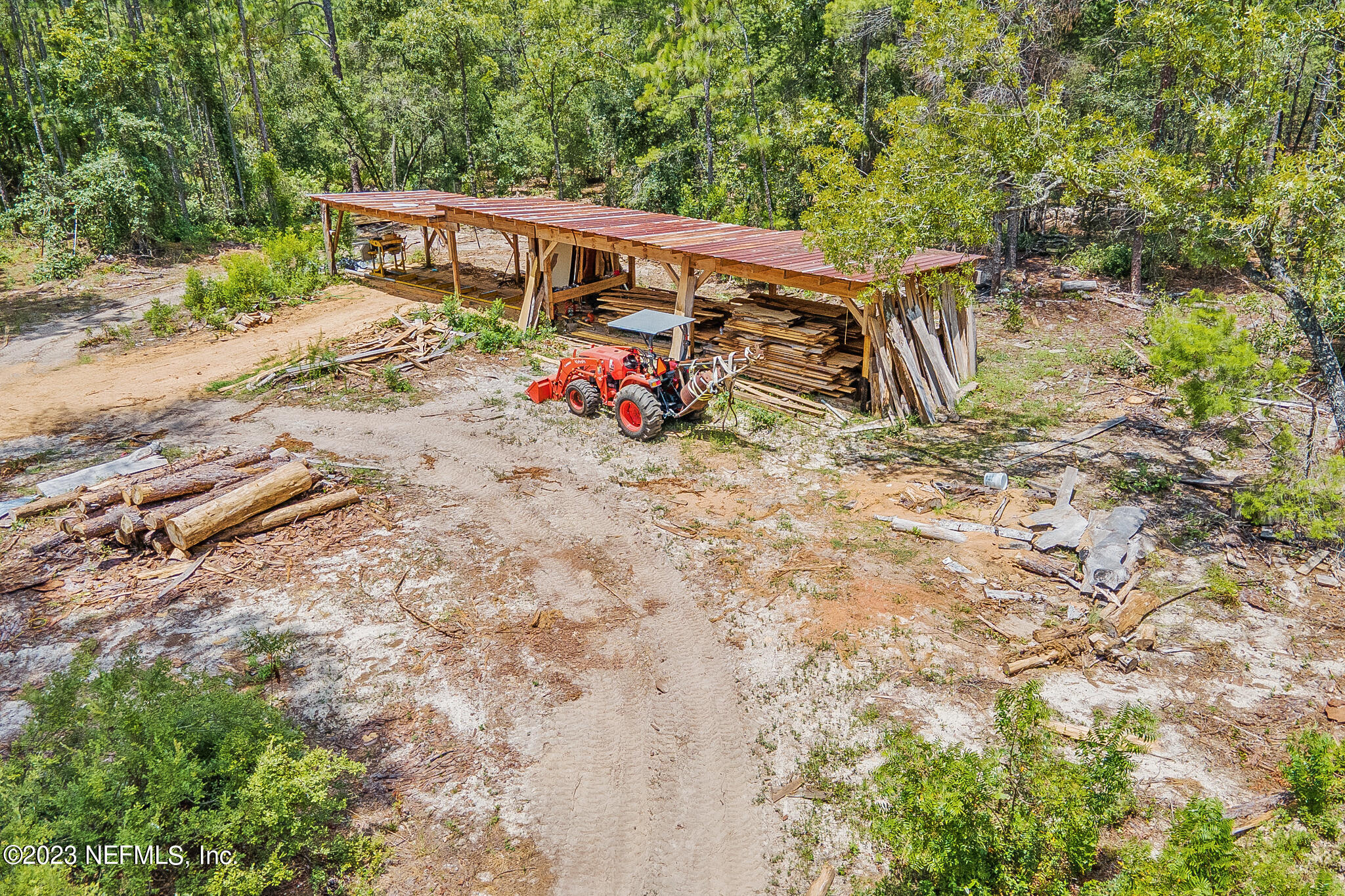 7730 Ranchette Road Keystone Heights, FL 32656 - Photo 20 of 30 an outdoor space with seating