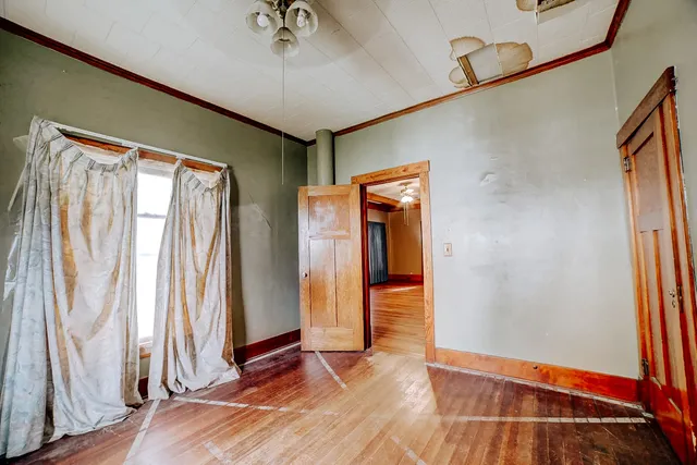 a view of a livingroom with wooden floor